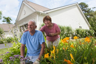 couple-doing-summer-yard-home-maintenance