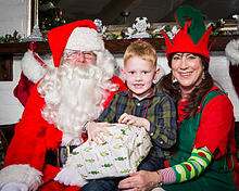 boy with elf and santa