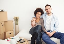couple_moving_into_home_with_boxes