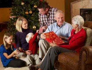 family_around_christmas_tree