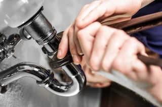 plumber_working_on_pipes