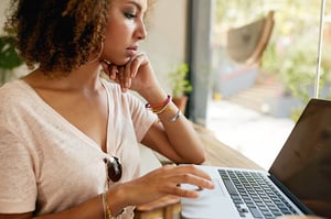 woman reading home maintenance blogs