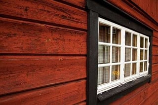 house_with_wood_siding_and_window