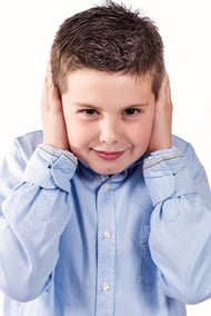 boy_covering_his_ears
