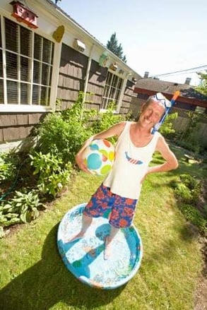 man_standing_in_kiddie_pool