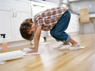 boy_wiping_wood_floors