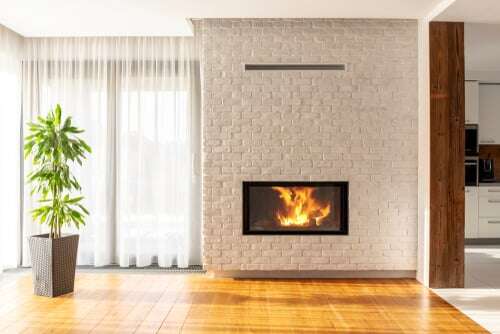 brick fireplace painted white