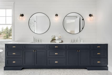 luxurious bathroom vanity with black cabinets