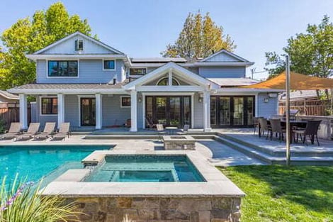 pool and hot tub in back yard