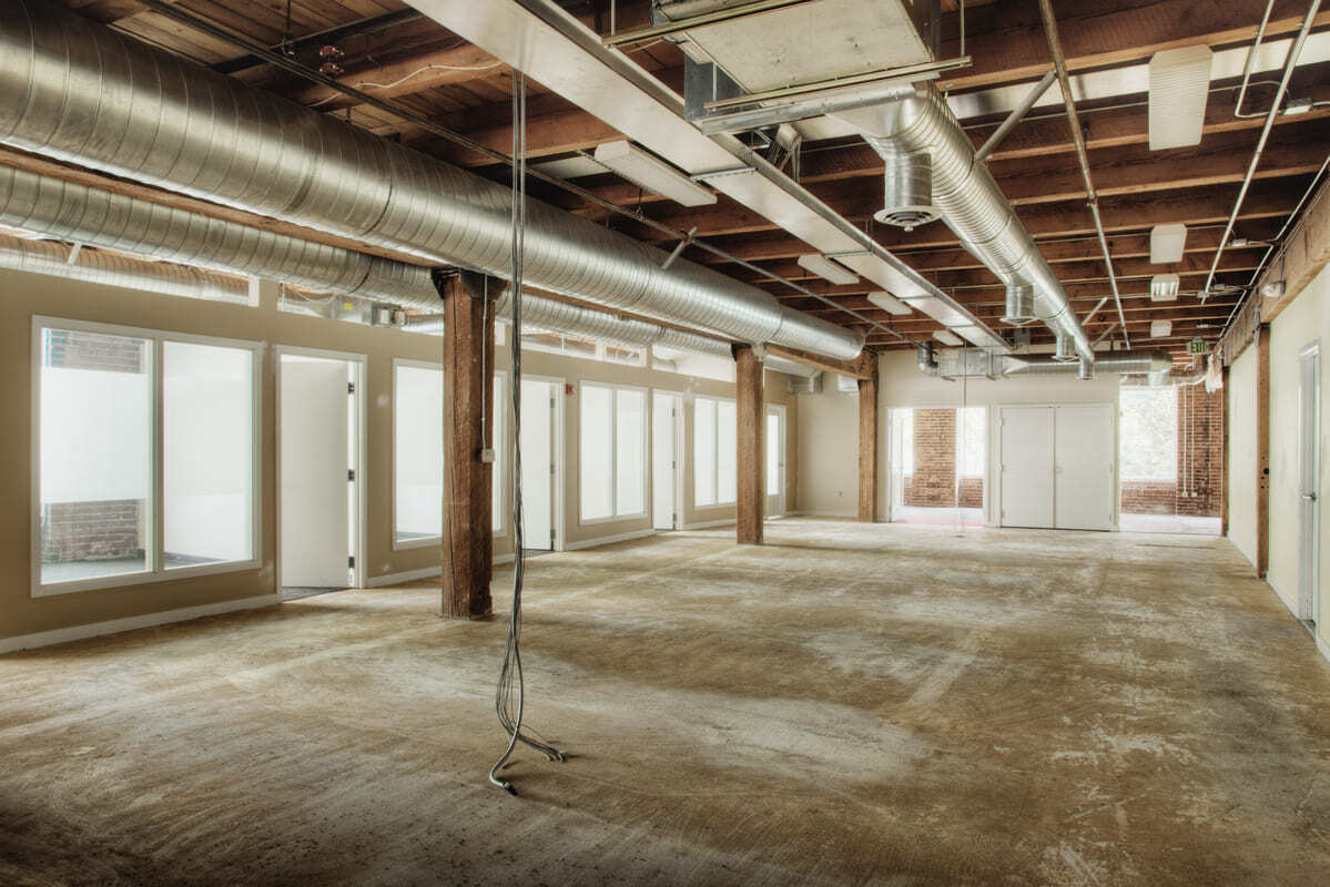 An empty commercial building being renovated.